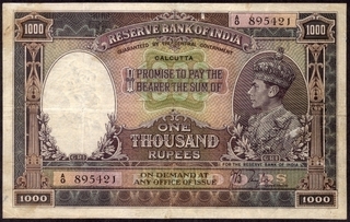 One Thousand Rupees Bank Note of King George VI Signed by J.B. Taylor of 1938 of Calcutta Circle.