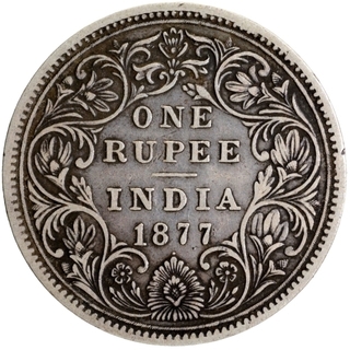 Error Silver One Rupee Coin of Victoria Empress of Bombay Mint of 1877.