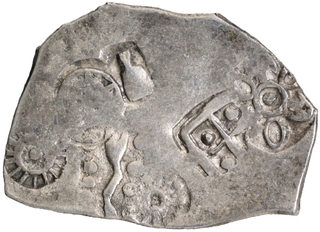 	A Punch Marked Silver Karshapana Coin of Magadha Janapada with Snake Like Symbol.	