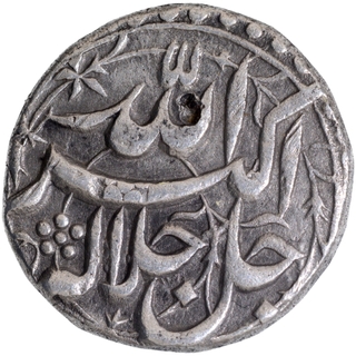 	Extremely Fine Silver One Rupee Coin of Akbar of Lahore Mint of Tir Month.	