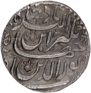 Silver Rupee Coin of Jahangir of Ahmadabad Mint, Persian legend  Shah Noor ud din Jahangir ibn Akbar Badshah.