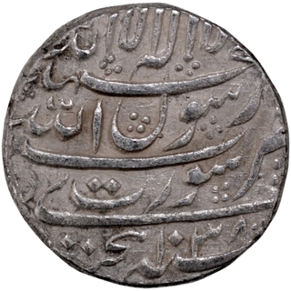 	Sharp Strucked Silver Rupee Coin of Shah Jahan of Surat Mint without any test mark.	