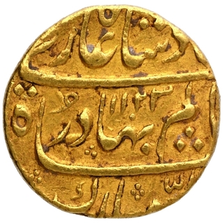 Specimen Like Floral Decorated Rare Gold Mohur Coin of Shah Alam Bahadur of Khujista Bunyad Mint in extremely fine condition.