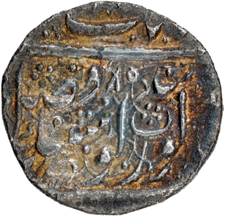 Rare Silver Rupee Coin of Sri Amritsar Mint of Sikh Empire in Nanakshahi Couplet with Persian legend zarb Sri Amritsar jiyo.