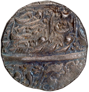 Silver Rupee Coin of Sri Amritsar Mint of Sikh Empire in Nanakshahi Couplet, With Persian legend zarb Sri Amritsar jiyo.