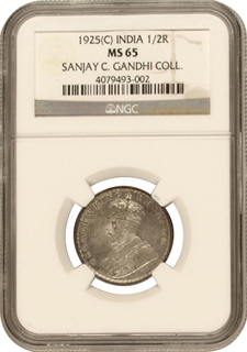 	2nd highest graded as MS 65 by NGC 1925 Silver Half Rupee Coin of King George V of Calcutta Mint.	