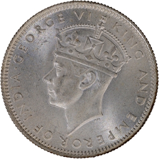 	Silver Twenty Cents coin of King George VI of 1939 of Malaya,  Roman legend COMMISSIONERS OF CURRENCY MALAYA.	