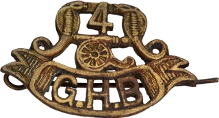 	Gwalior Brass Artillery Shoulder Title Badge of th Gwalior heavy Battery.	