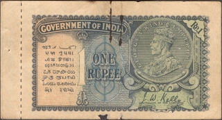 	One Rupee Banknote of King George V Signed by J W Kelly of 1935 with booklet selvage.	