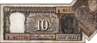 	Extremely Rare 25% Extra Paper Error Ten Rupees Banknote Signed by R N Malhotra of Republic India In Extremely fine Condition	