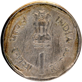 	Rare & UNC Brockage Error Copper Nickel One Rupee Coin of Calcutta Mint of Republic India.	