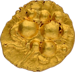 Gold Half Fanam Coin of Chalukyas of Kalyana with Nagari letter on the reverse.