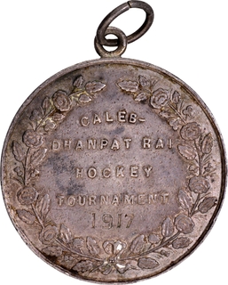 Silver Winners Medal of Caleb-Dhanpat Rai Hockey Tournament of 1917.