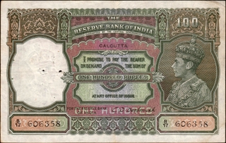 Rare One Hundred Rupees Banknote of King George VI Signed by C D Deshmukhr of 1938 of Calcutta Circle.