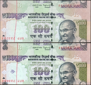 Incorrectly Positioned Sheet Cutting and Inverted Serial Number Error One Hundred Rupees Banknote Signed by Raghuram G Rajan of Republic India of 2014.