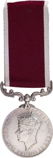 Silver Medal of King George VI for Indian Army Long Service and Good Conduct.