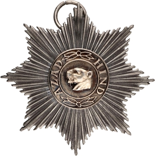 Extremely Rare Star Medal made of Silver and Bronze of Azad Hind Order.