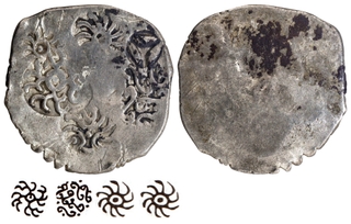 Kashi Janapada Punch Marked Silver Vimshatika Coin with Scyphate shape.