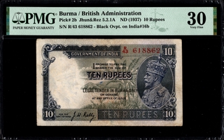 PMG Graded Ten Rupees Burma Issue Banknote of King George V of 1937 of  British India Signed by J W Kelly.