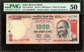 PMG Graded Security Thread Missing Error Thousand Rupees Banknote of Republic India of 2015 Signed by Raghuram G Rajan.