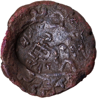 Copper Coin of Agroha Janapada of Post Mauryan period with a tree overstruck on ten arched hill.