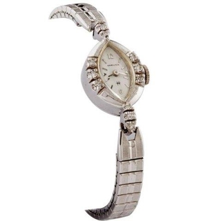 White Gold ladies watch studded with solid diamonds.