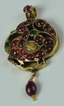 Peacock Gold Pendant Studded with Red Burmese Rubies of Emeralds and White Sapphires.