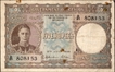 King George VI of Ceylon 1944 Five Rupees Banknote Signed by H J Huxham and C H Collins.