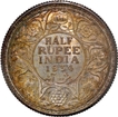 Uncirculated Silver Half Rupee Coin of King George V of Calcutta Mint of 1934 with Toning.