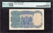 Very Rare in this grade as PMG 53 Ten Rupees Banknote of King George V Signed by J W Kelly of 1935.